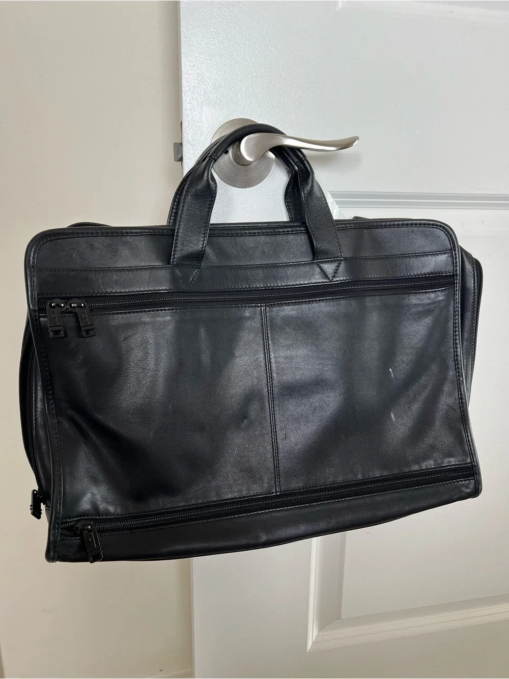 Tumi sleek leather